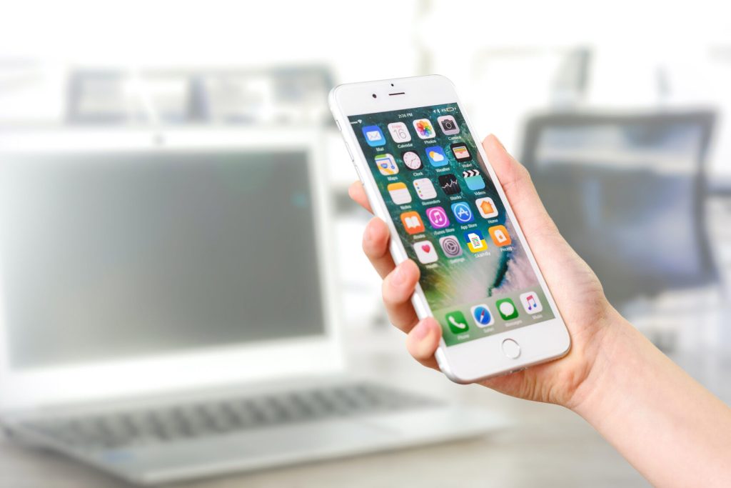 Mobile phone showing AI plagiarism checker application